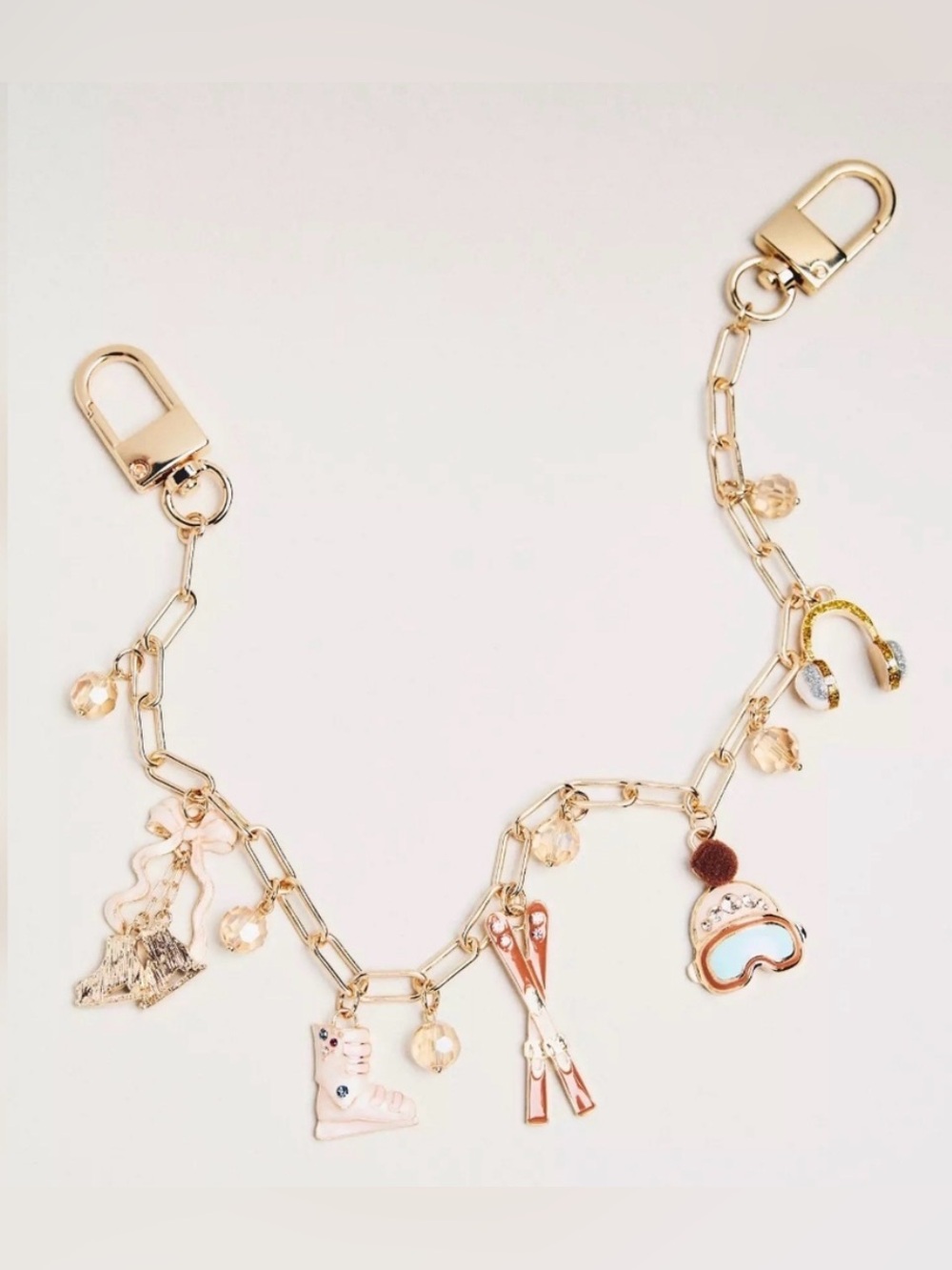 Anthropologie Party Bag Charm Ski Theme in Gold Tone NWT